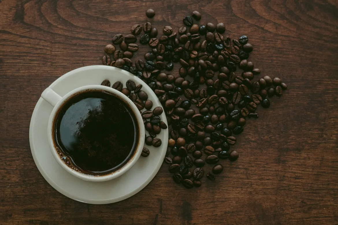 Espresso cup with coffee beans